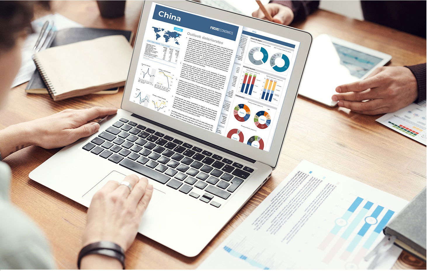 business person looking at focusanalytics data platform on a laptop